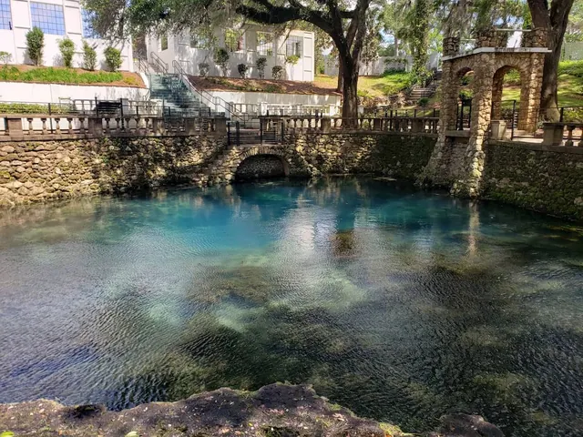 outdoor natural hot spring pool with green blue water at radium springs georgia