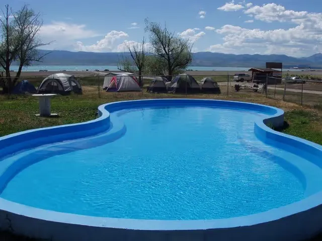 Outdoor pool on the sandy shore of Bear Lake at Bear Lake Hot Springs, Idaho.