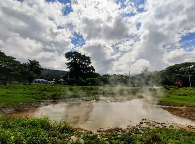 Ulu Slim Hot Spring Malaysia - steaming geothermal pool in forested Kampung Ulu Slim Perak