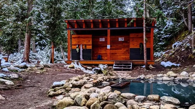 Outdoor hot springs with a changing room at halfway hot springs in bc canada