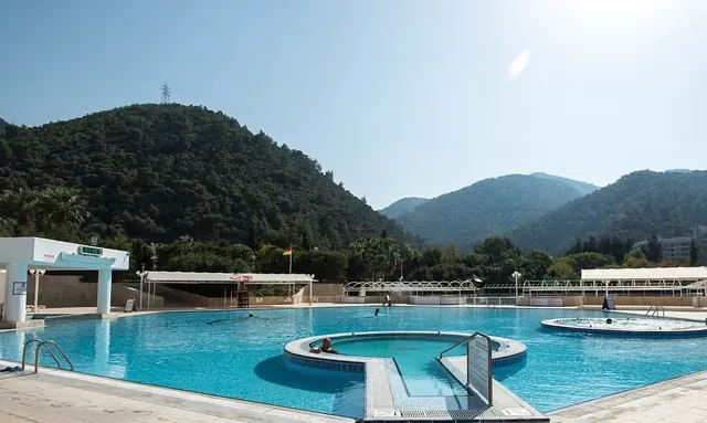 Outdoor thermal baths with mountain backdrop in Izmir, Turkey