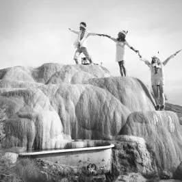 Black-and-white photograph of the outdoor bathing tubs — Mystic Hot Springs