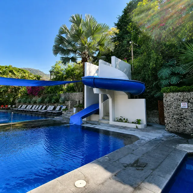 Outdoor pool and slide — Santa Teresita Hotel y Spa Termal