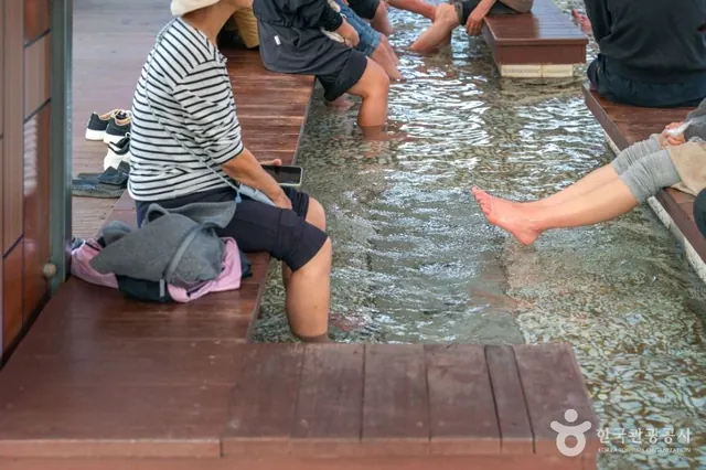 Visitors using the footbath — Suanbo Hot Springs